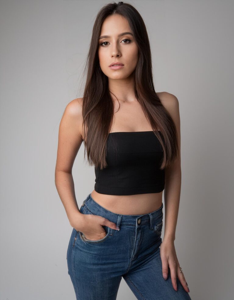 Firefly a young woman modeling for her portfolio; she's wearing a black top and black jeans. 35 mm l (2)